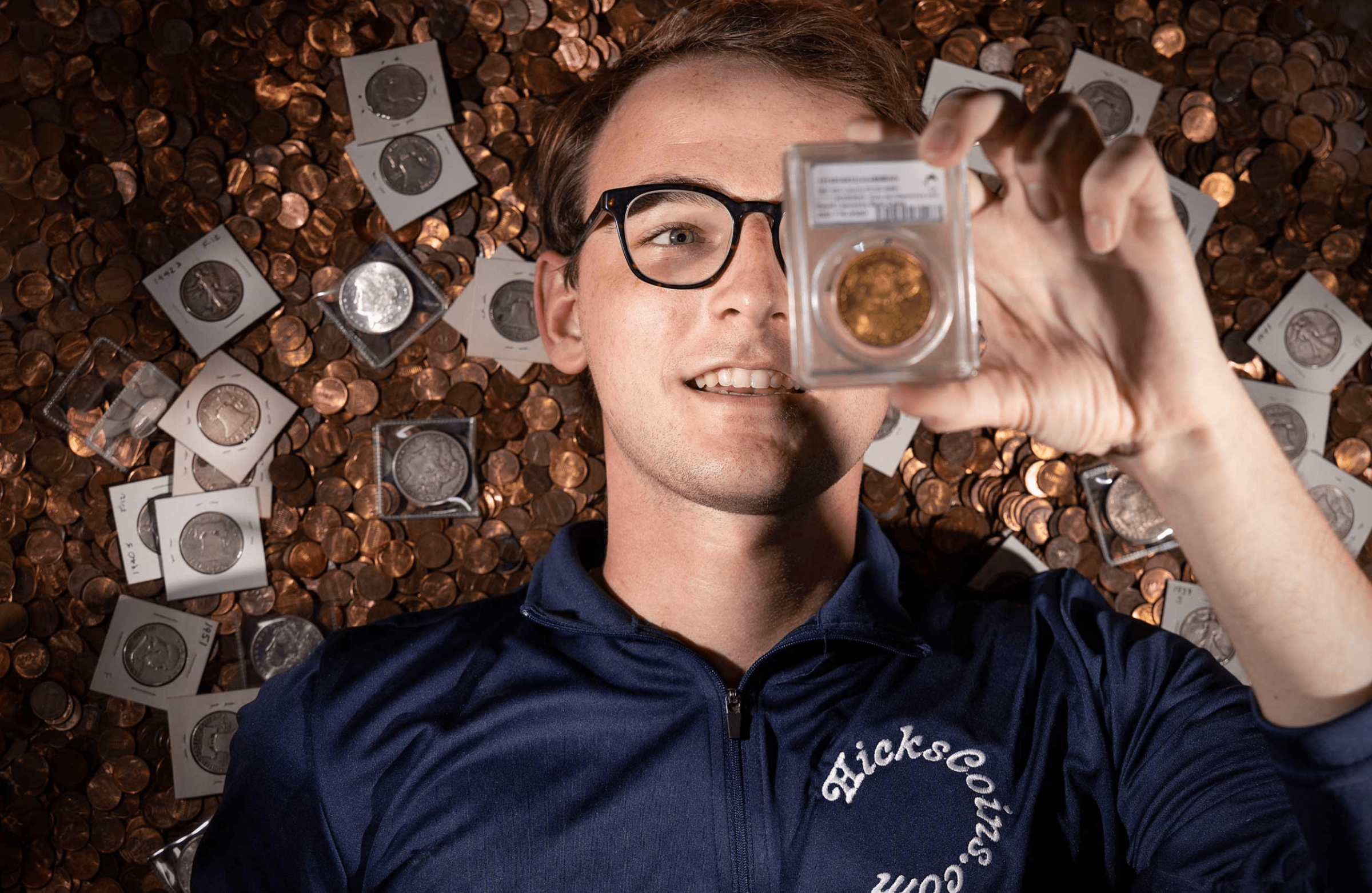 UVA fourth-year student Hunter Hicks is a numismatist, or a coin collector, a passion he picked up at just 10 years old. (Photo by Matt Riley, University Communications)